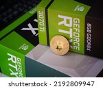 Small photo of Tambov, Russian Federation - August 20, 2022 Two Nvidia RTX 3070 and 3070 Ti gaming graphics cards boxes with a Bitcoin on them.