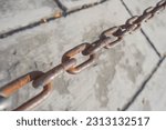 Small photo of An rusty iron chain. Close-up daylight during the day. Concept of strength, mutual assistance, arrest, imprisonment, cumbersome, justice, unity, togetherness, solidarity, inseparable.