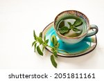 Cup With Mint Tea On A White...