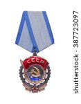 Small photo of Nonexistent awards of the nonexistent country. Soviet Order of the Red Banner of Labour. It is isolated, the worker of paths is present.