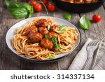 Spaghetti pasta  with meatballs and tomato sauce,  selective focus