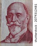 Small photo of Serbian 1000 dinara currency banknote, close up. Serbia money RSD dinar cash, macro view, portrait of Dorde Vajfert.