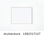 hanging wood frame image mockup.... | Shutterstock . vector #1582517137