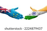 Small photo of Handshake between Tuvalu and India flags painted on hands, isolated transparent image.