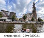 Small photo of Amsterdam, NL - October 10, 2021: The Westerkerk, Western Church is a Reformed church within Dutch Protestant Calvinism in central Amsterdam, Netherlands.