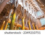 Small photo of Barcelona, Spain - February 9, 2022: View from the astonishing interior of La Sagrada Familia, a large unfinished minor basilica in the Eixample district of Barcelona, Catalonia, Spain.