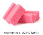 Small photo of pieces of pink bubble gum isolated on white backrgound