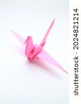 Cool pink folding crane ...