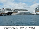 Small photo of Nassau, Bahamas 12 03 2023: Four cruises, Mariner of the Seas, ship of Royal Caribbean International, Disney Wish the cruise vessel operated by Disney Cruise Line and two others moored in Bahamas.