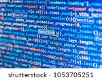 Javascript code in bracket software. Programmer typing new lines of HTML code. Script procedure creating. Big data database app. Website codes on computer monitor. 