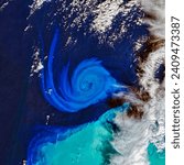 Small photo of Carbonate Swirls Spin from the Bahamas. Hurricane Nicole turned the shallow waters along the Abaco Islands into an eddy factory. Elements of this image furnished by NASA.