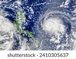 Small photo of Rapid Intensification for Typhoon Chanthu. The potent storm in the Western Pacific intensified from a tropical depression to a super typhoon. Elements of this image furnished by NASA.