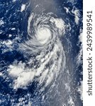 Small photo of Typhoon Banyan 14W in the central Pacific Ocean. Typhoon Banyan 14W in the central Pacific Ocean. Elements of this image furnished by NASA.