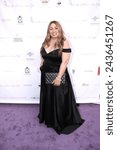 Small photo of Los Angeles, CA - March 8, 2024: Latisha Longoria attends the International Women's Day Awards and Gala at the Taglyan Event Center.