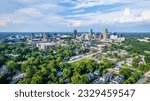 Small photo of View of downtown Raleigh, North Carolina with blue sky background.