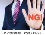 A businessman and "NG". White background.