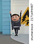 Small photo of Bangkok, Thailand - June 22, 2022: Standee of Baby Gru from An Animation Movie Minions 2 : The Rise of Gru