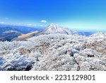 Small photo of Snow scenery at the top of Mt.Tsurumi-dake in Beppu city, Oita prefecture, Japan: Mt. Yufu-dake behind