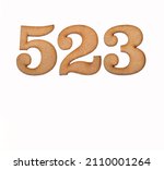Small photo of Number 523 in wood, isolated on white background