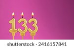 Small photo of Birthday card with candle number 133 - purple background