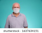 Old Man With Face Mask Against...