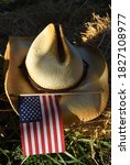 Cowboy Hat And American Flag In ...