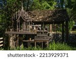 Small photo of Old wooden structure of the spirit house or Shrine of the household god, Phra Phum Shrine, Joss house in Thai culture. Built for guardian spirits to reside for the protective spirit of a place.