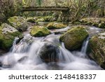 Small photo of Old and precarious wooden bridge over a river in Courel Mountains Geopark in Lugo Galicia