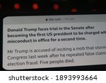 Small photo of Moscow, Russia - 14 January 2021: CNN news with Donald Trump faces trial in the Senate after becoming the first US President to be charged with misconduct in office for a second time headlines.