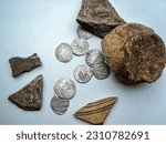 Small photo of Treasure of silver coins of the 15th century - dangi, Eastern Europe, Golden Horde. Artifact, archaeological discoveries, search for treasures and artifacts.