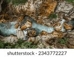 Emerald Soca River in Soca Valley, Slovenia. Aerial Drone Top Down view.Summer outdoor activities.Crystal clear water.Rafting and kayaking place in Europe.Wilderness adventure concept.Pure nature