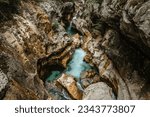 Emerald Soca River in Soca Valley, Slovenia. Aerial Drone Top view.Summer outdoor activities.Crystal clear water.Rafting and kayaking place in Europe.Wilderness adventure concept.Pure nature