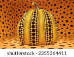 Small photo of Washington DC, USA-July 5, 2023; Close up of iconic yellow pumpkin by artist Yayoi Kusama in the Hirshhorn Museum and Sculpture Garden as part of the One with Eternity exhibition