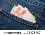 Small photo of Russian banknote five thousand rubles in a jeans pocket, ready money