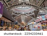 Small photo of Valencia, Spain - july 2022: Interior Spaces, People and Architecture of the Mercado Central, the principal Food Market in Valencia, Spain.