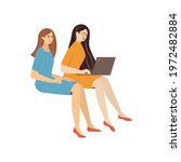 two smiling girls sit chatting... | Shutterstock .eps vector #1972482884