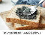 Black sesame spread on a bread 
