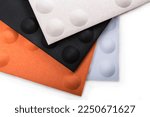 Small photo of Acoustic panels with convex spheres in beige, black, orange, light blue colors