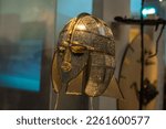 Small photo of Sutton Hoo helmet, is an ornate Anglo-Saxon helmet that was found during a 1939 excavation in the Sutton Hoo burial ship, was buried around the year 625 and is believed to have belonged to King Redval