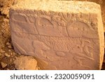 Small photo of Gobekli Tepe is an archaeological site, located about 18 km northeast of the city of Sanliurfa in present-day Turkey. A complex of stone buildings dated to the 10th millennium BC was found there.