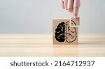 Small photo of Brain shaped black wooden jigsaw puzzle with copy space. Concept The missing piece of the brain puzzle, mental health and memory problems. Solve problems intelligently