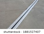 roof structure or bridge expansion for safe connection of two expandable concrete bodies. rubber joint in a metal bar