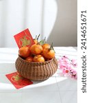 Small photo of Oranges in rattan basket (with Chinese character "Fu" means Fortune) Chinese New Year festival concept.