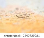 Small photo of "Gujarat" on a colorful map of India. ( written in Hindi letter)