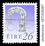 Small photo of TURIN, ITALY - DECEMBER 11, 2020: A stamp printed in IRELAND showing image of the Bishop's Crosier of Lismore, Irish Heritage and Treasures series, circa 1990