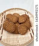 Small photo of Almond Kookie placed in bamboo weave basket