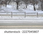 Snow Covered Fence On The...