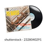 Small photo of Please Please Me is the first album by the musical group The Beatles. isolated white background. Udine Italy_July 4 2023