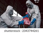 Small photo of Contain Chemical Spill to Red Garbage Bags After Absorb, Part of Steps for Dealing with Chemical Spillage, Spill Cleanup Procedures, Basic Practical Training for Chemical Spill Clean-up.