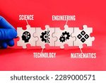 Wooden puzzle connection with STEM icon. science, technology, engineering, mathematics education word with icons. 
